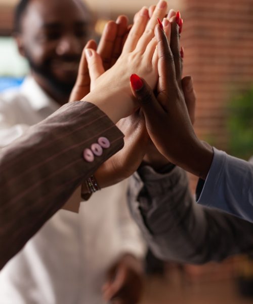 Happy,Excited,Businesspeople,Rising,Hands,Celebrating,Successful,Partnership,Enjoying,Together